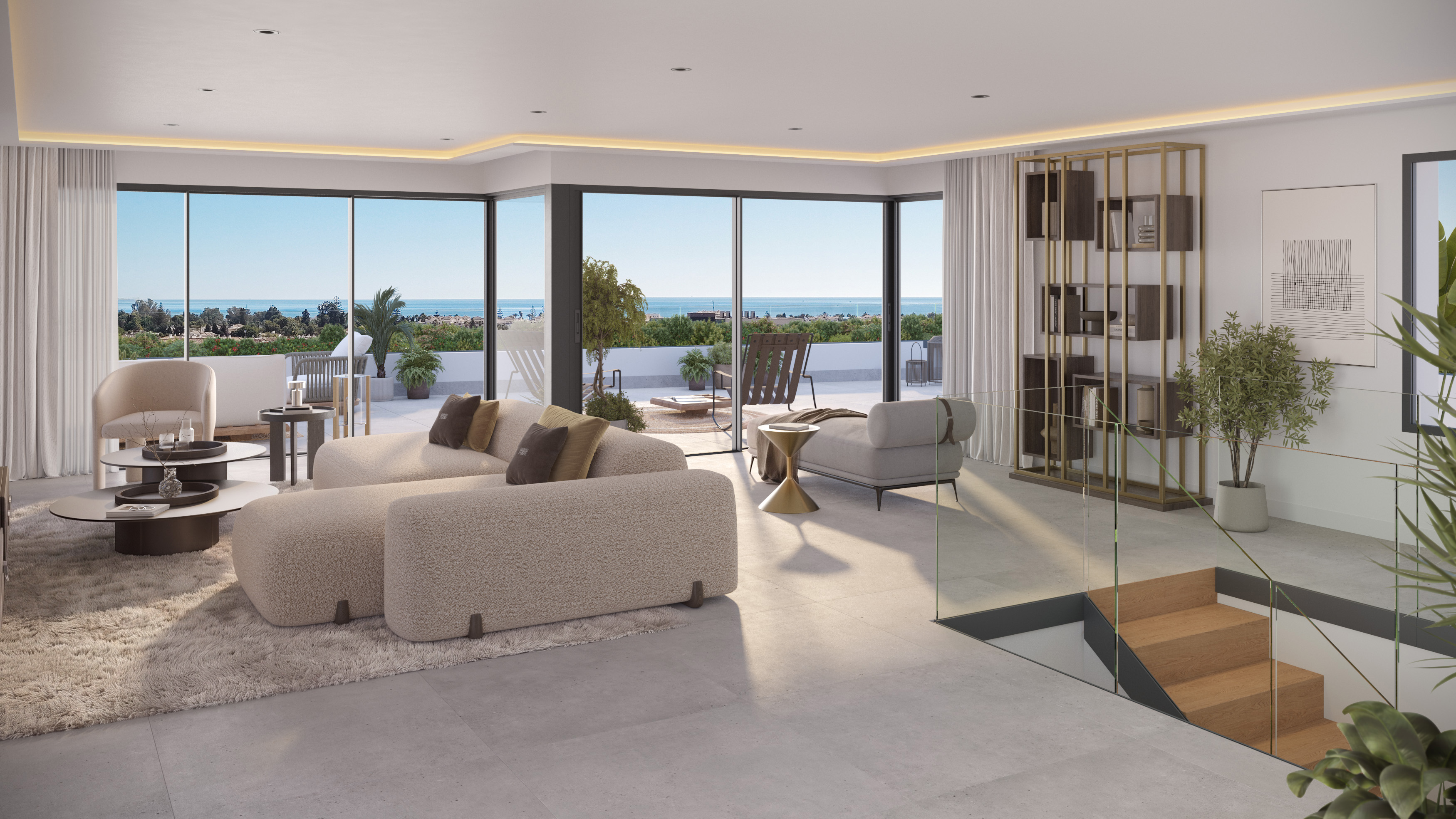Open-plan living room of a Marbella West apartment with floor-to-ceiling glazing