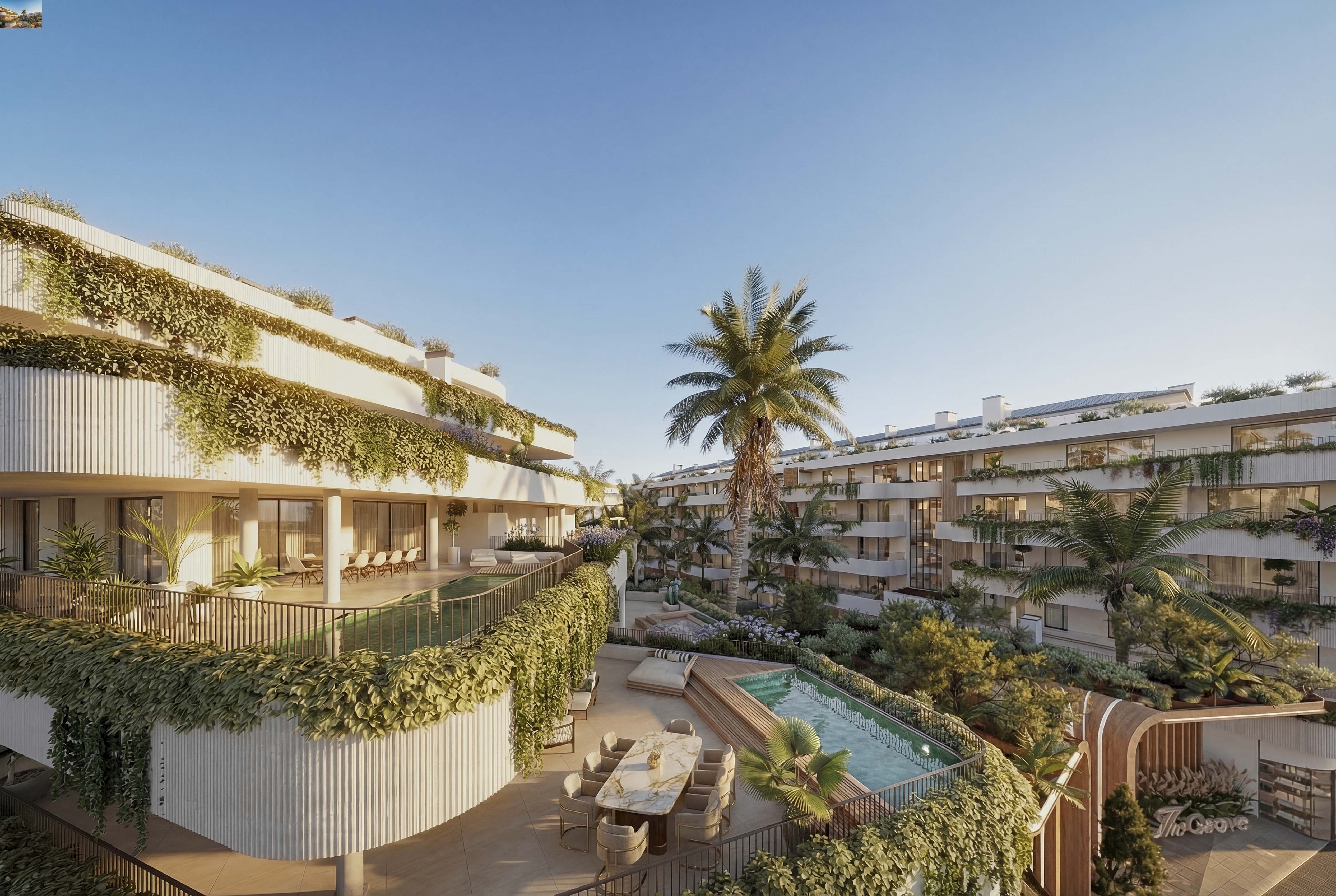 Landscaped gardens and pool area of the development in Marbella West